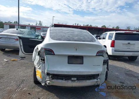 2023 Tesla Model Y Awd/Long Range Dual Motor All-Wheel Drive из США, поврежденный, VIN 7SAYGDEE0PA105157